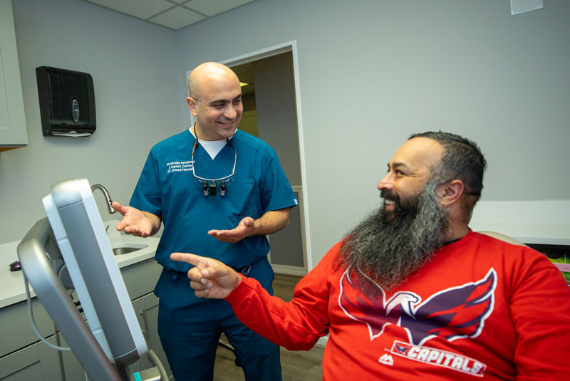 dr haswasli with daniel explaining procedure